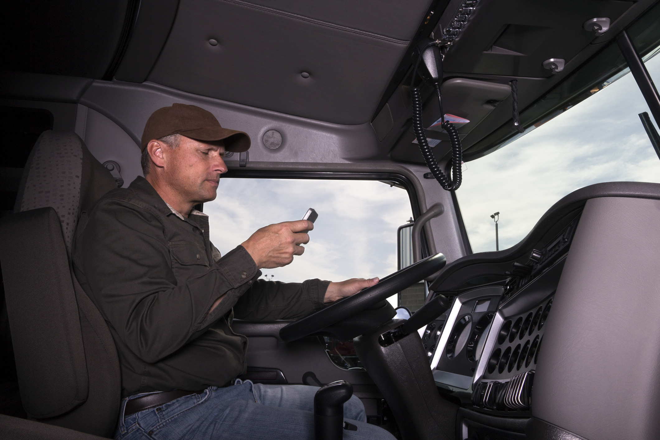 Truck driver texting while driving