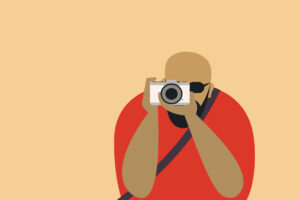 Man looks through his camera